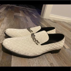 I am selling these white shoes that have been worn 1 time but have no damage